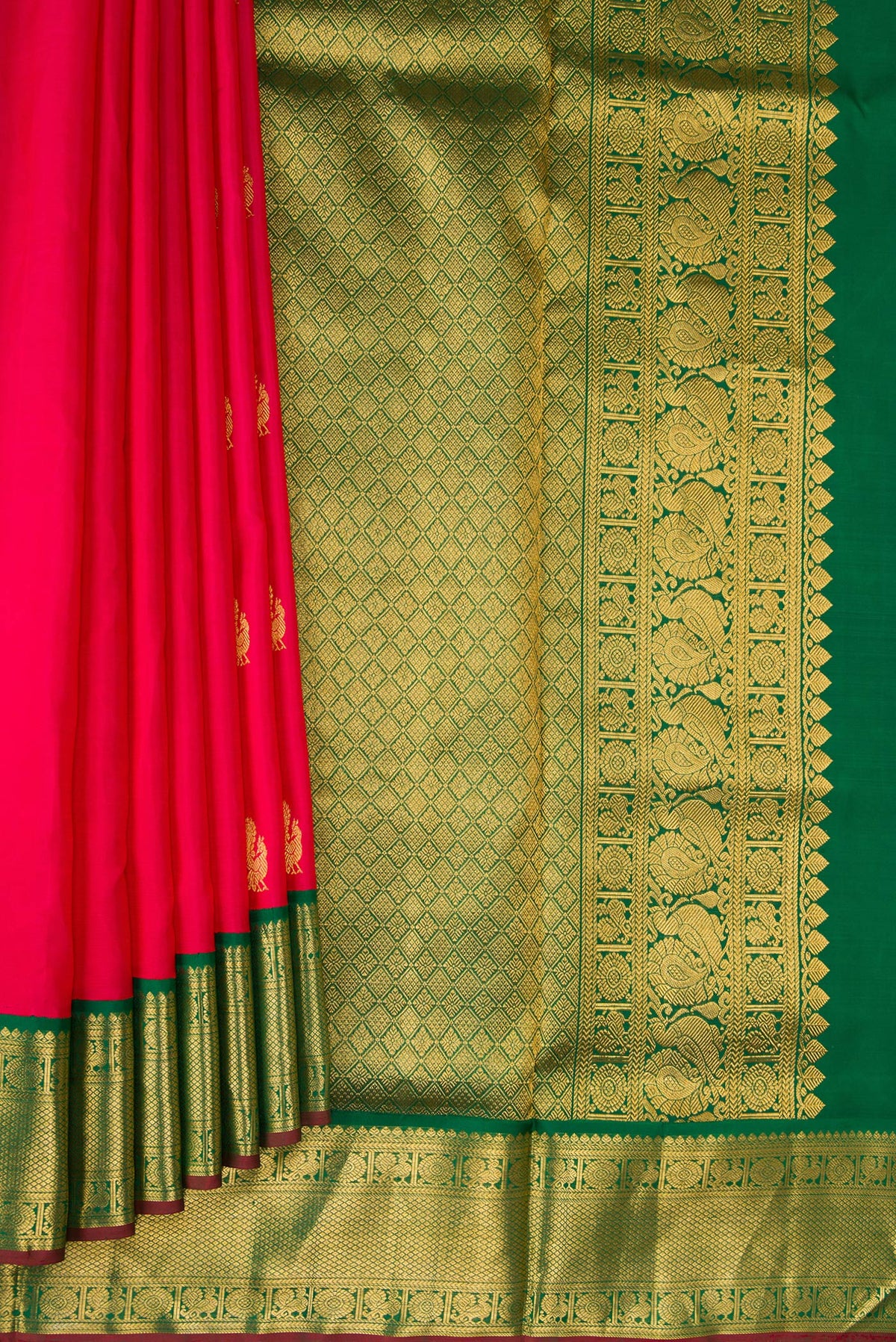 Pleats and pallu of Pure Silk Pure Zari Dark Pink Dual Tone Kanchipuram Nine Yards Saree with Zari Butta on the body and Zari Border. 