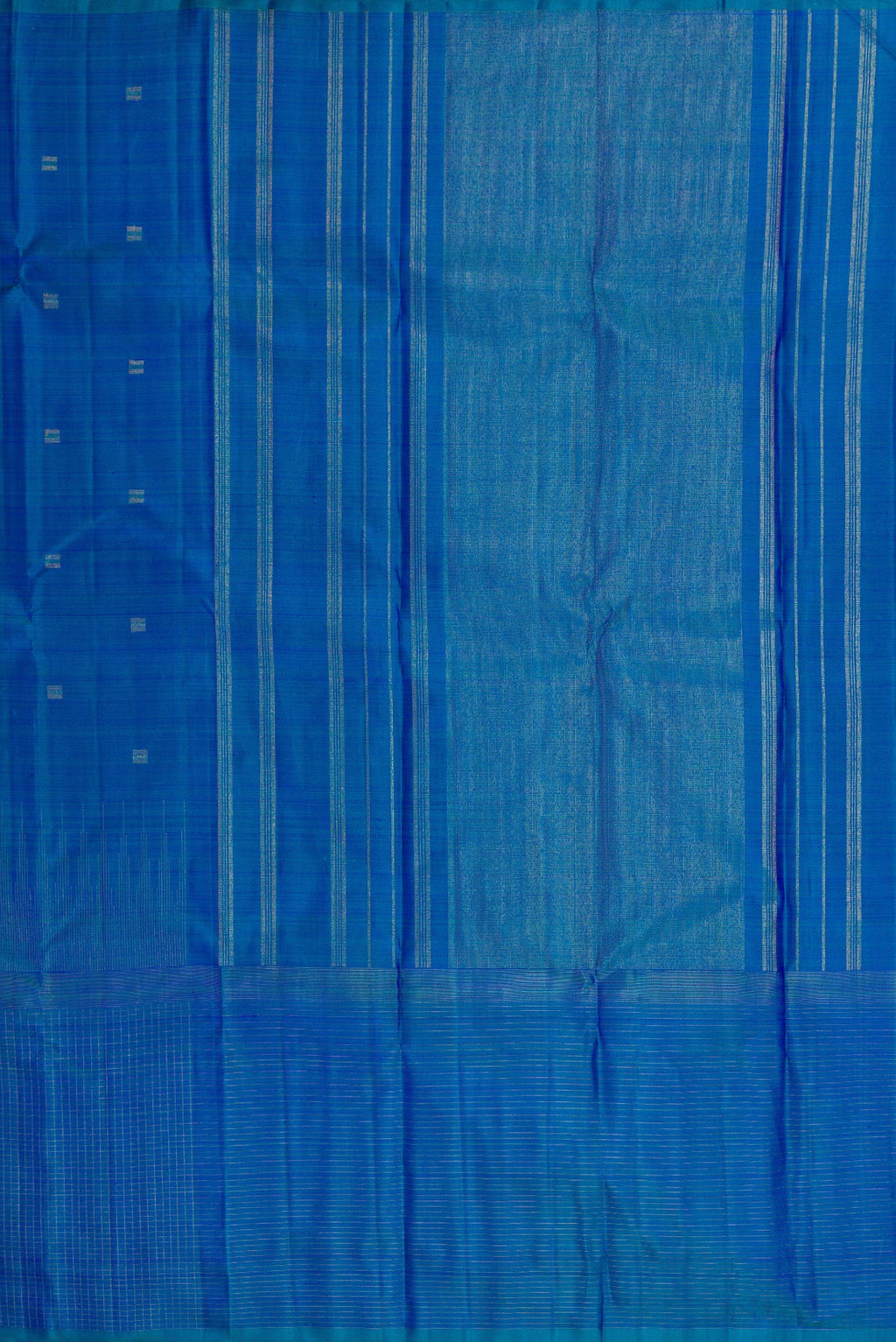 Close up image of the pallu of Pure Silk Pure Zari Peacock Blue Dual Tone Kanchipuram Saree with Zari Butta on the body and Zari Border. 