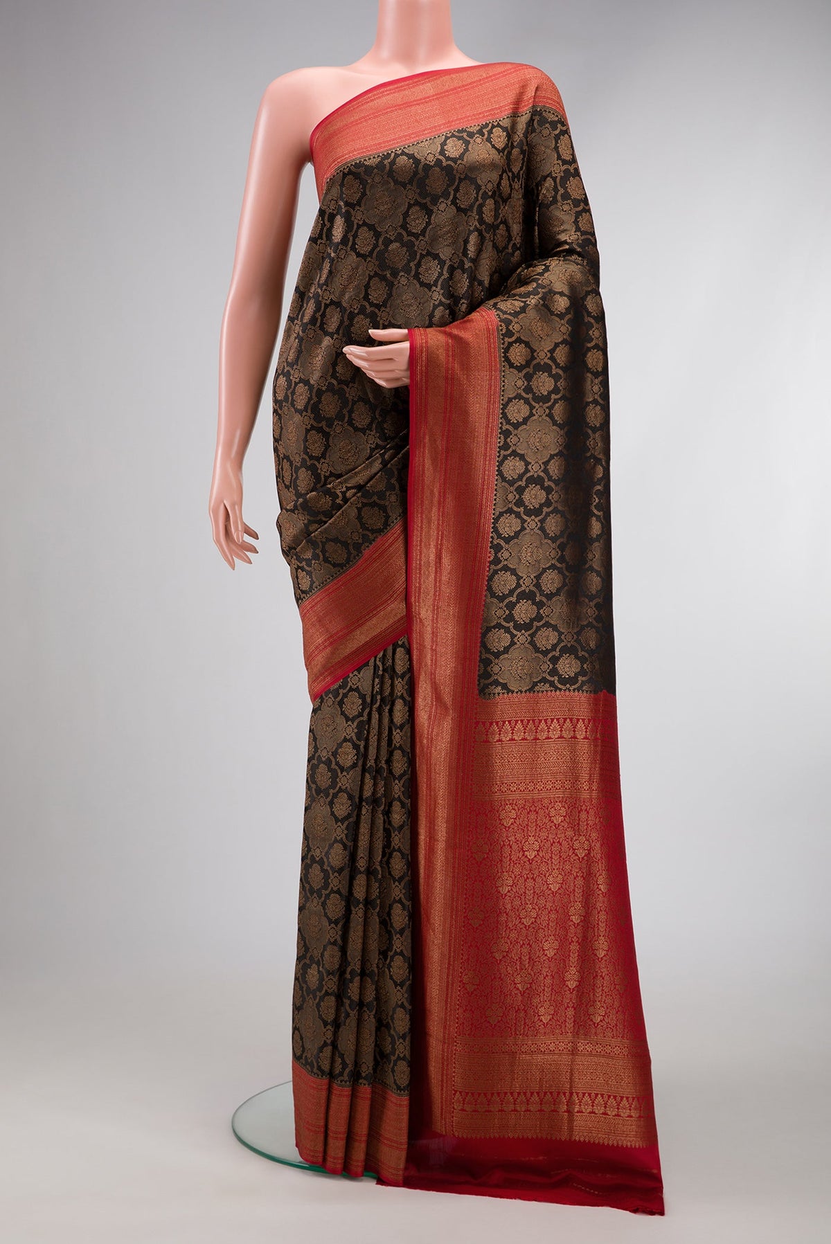 Black Dual Tone Mysore Crepe Saree with Zari Brocade on the body and Zari Border.  displayed on a mannequin