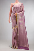 Lavender Dual Tone Mysore Crepe Saree with Zari Brocade on the body and Zari Border.  displayed on a mannequin