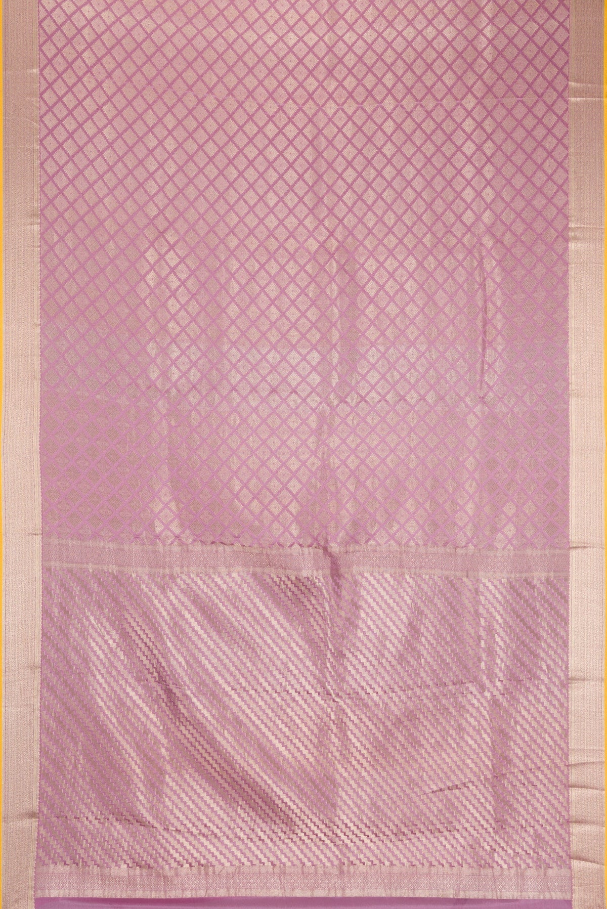 Flat view of Lavender Dual Tone Mysore Crepe Saree with Zari Brocade on the body and Zari Border. 