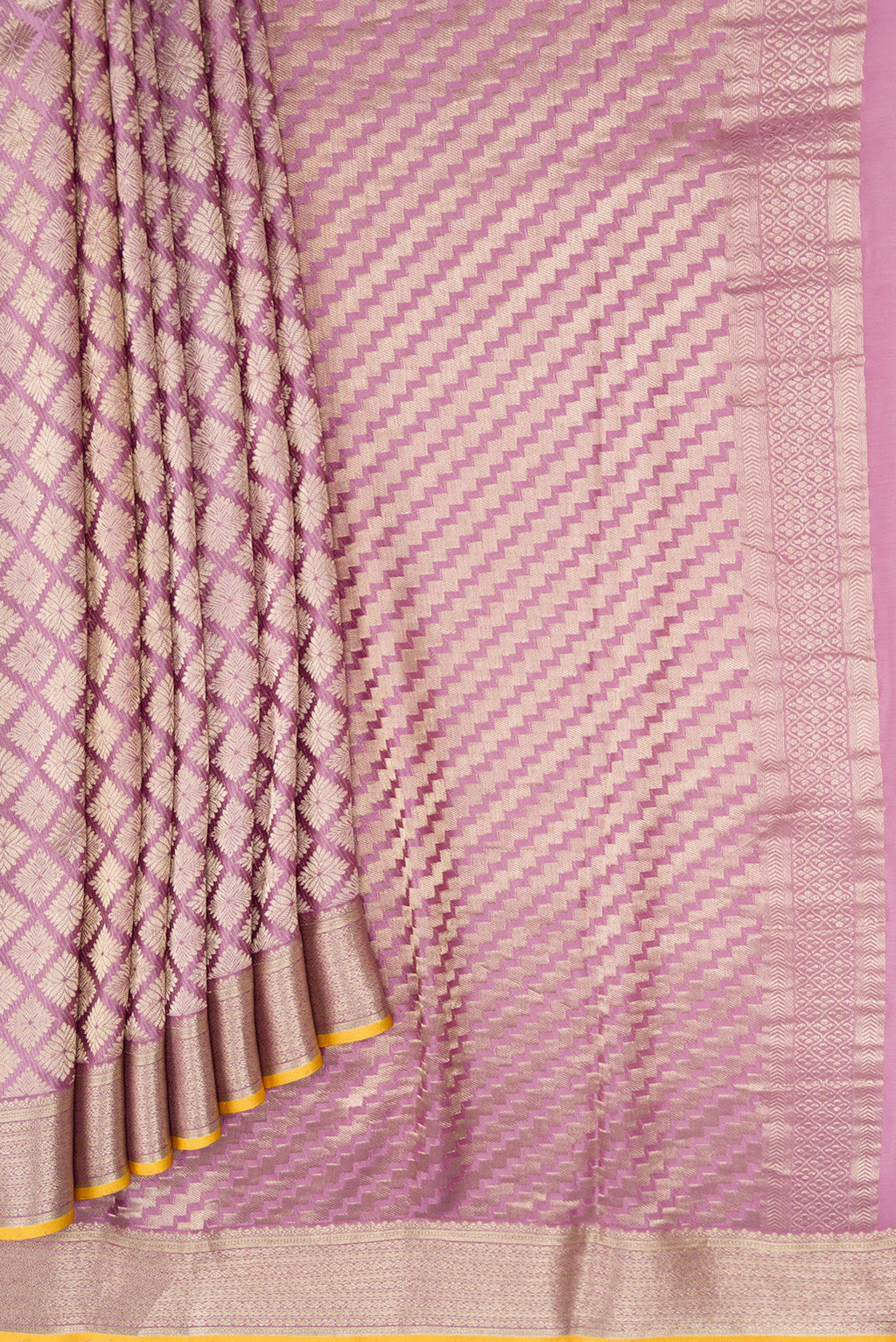 Pleats and pallu of Lavender Dual Tone Mysore Crepe Saree with Zari Brocade on the body and Zari Border. 
