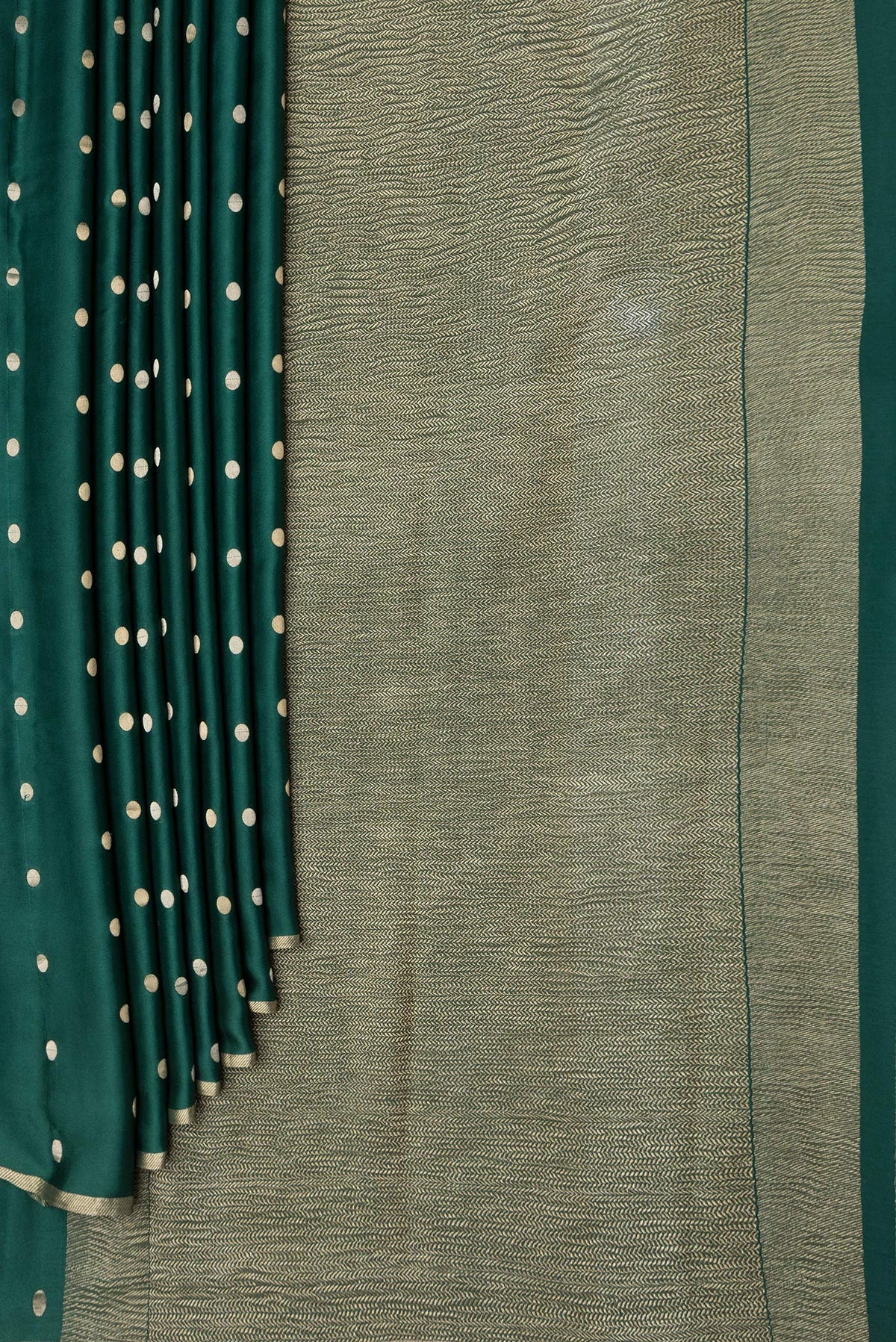 Pleats and pallu of Bottle Green Dual Tone Mysore Silk Saree with Zari Butta on the body and Zari Border. 