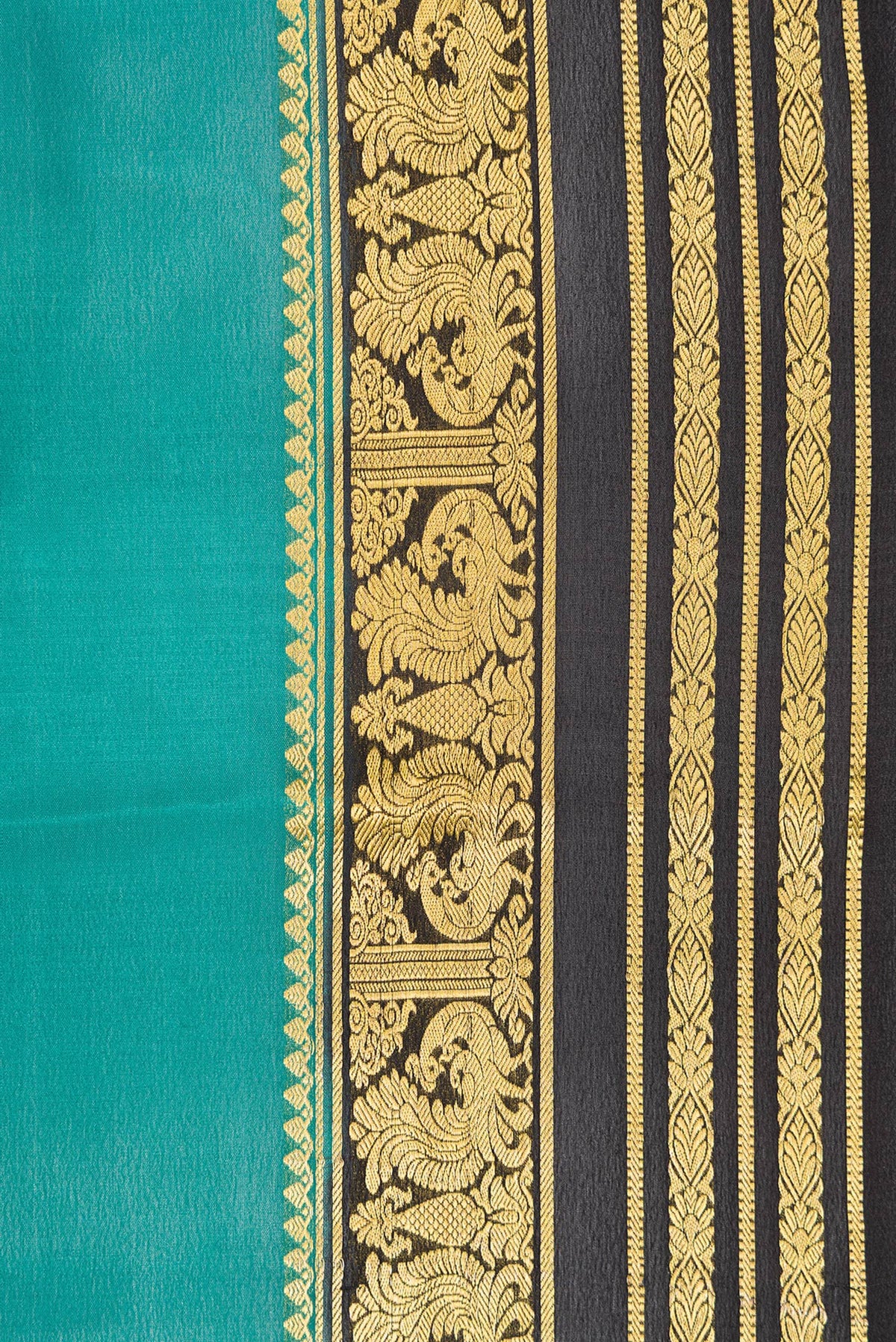 Border image of Green Dual Tone Mysore Silk Saree with Plain Body and Zari Border. 