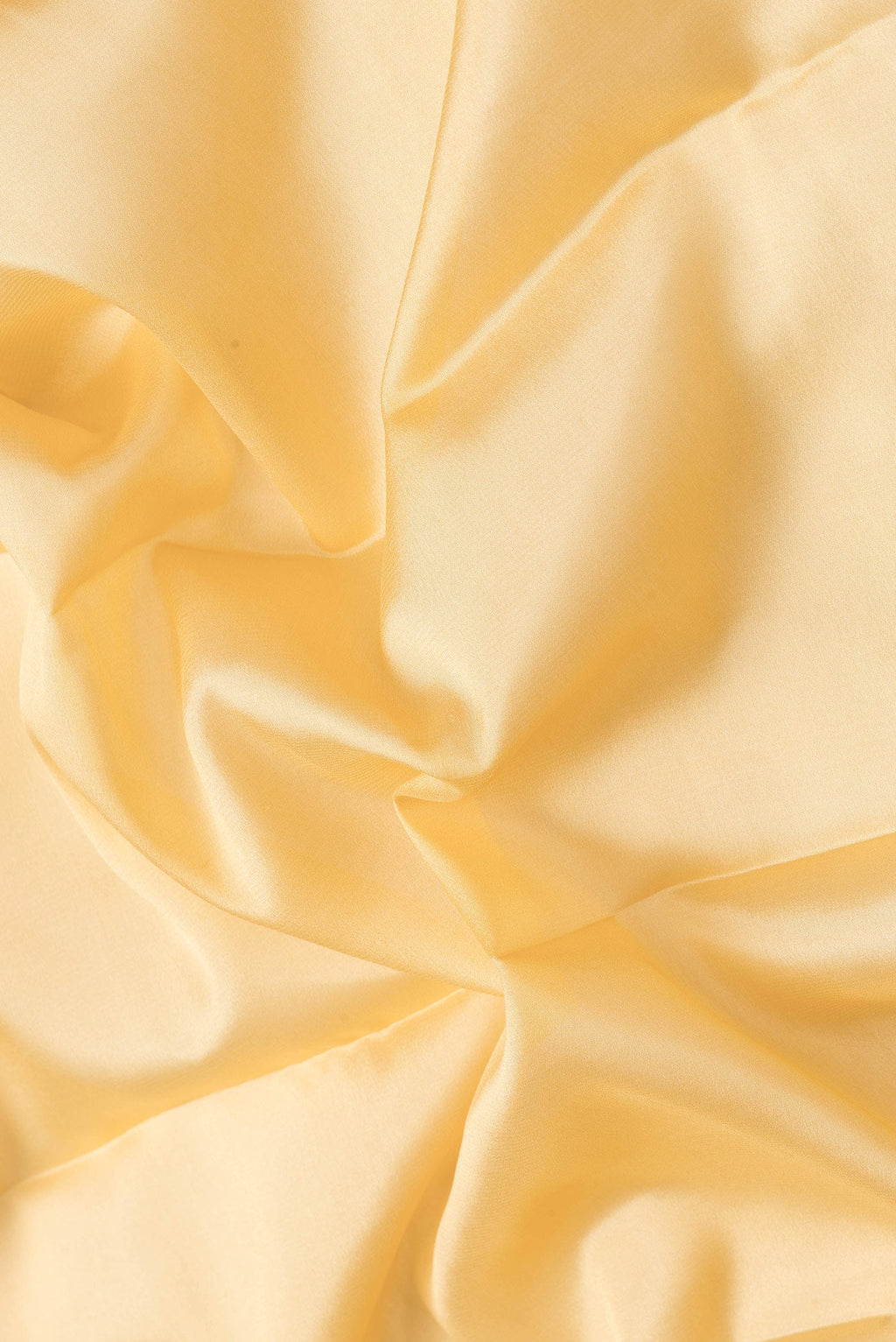 Close up of Sandal Dual Tone Mysore Silk Saree with Plain Body and Zari Border.  displaying folds