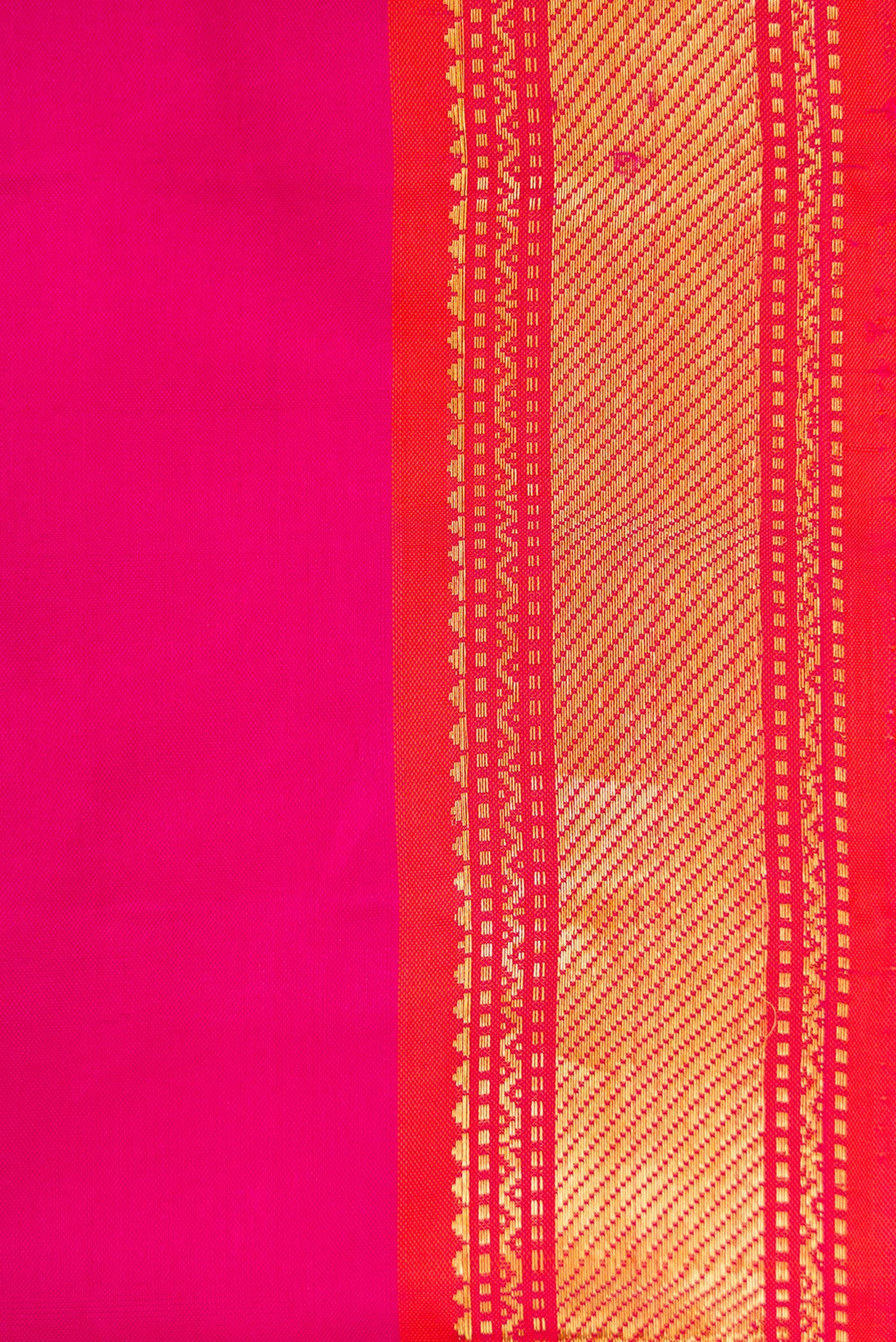 Border image of Magenta Dual Tone Kanjivaram Silk Saree with Plain Body and Zari Border. 