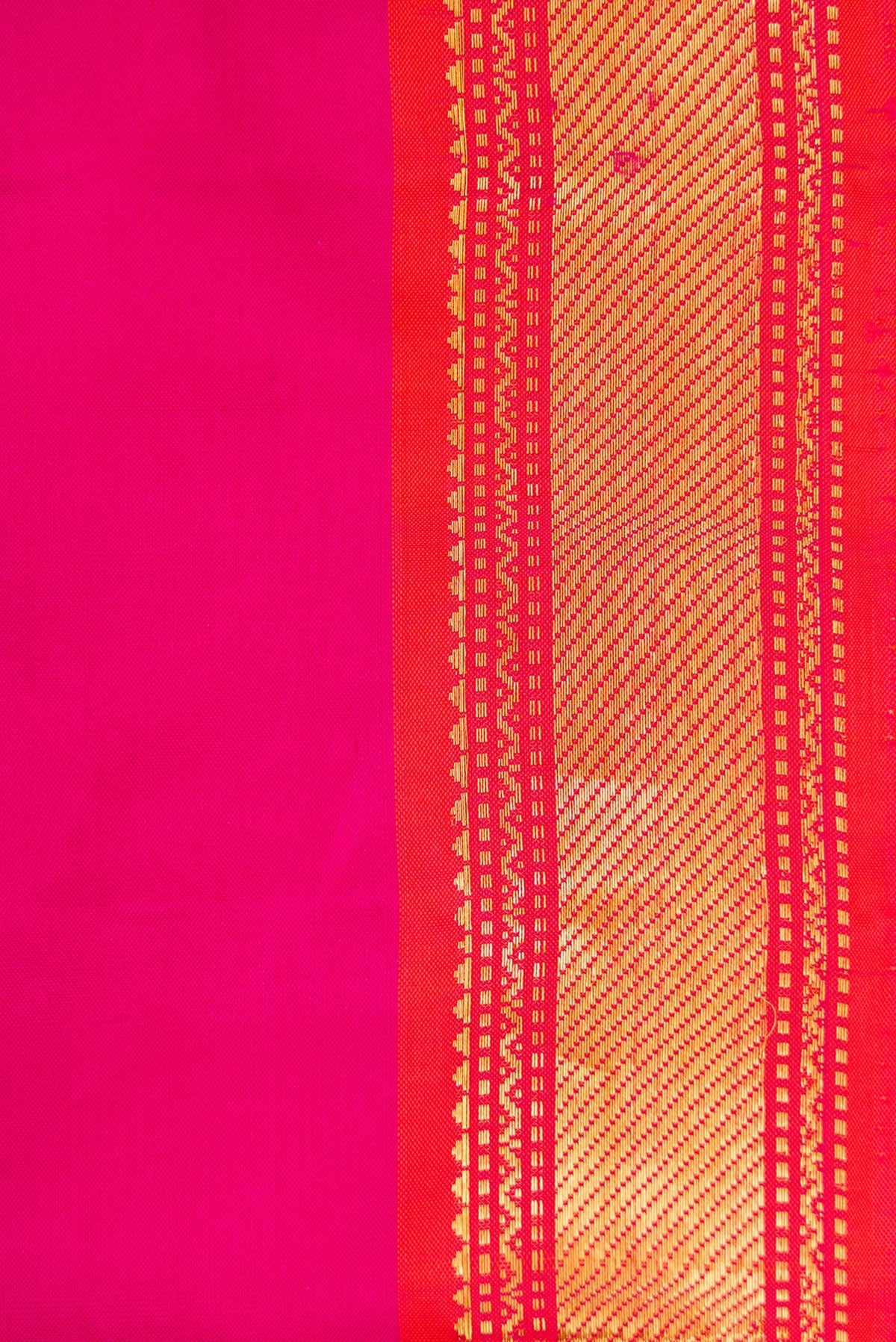 Border image of Magenta Dual Tone Kanjivaram Silk Saree with Plain Body and Zari Border. 