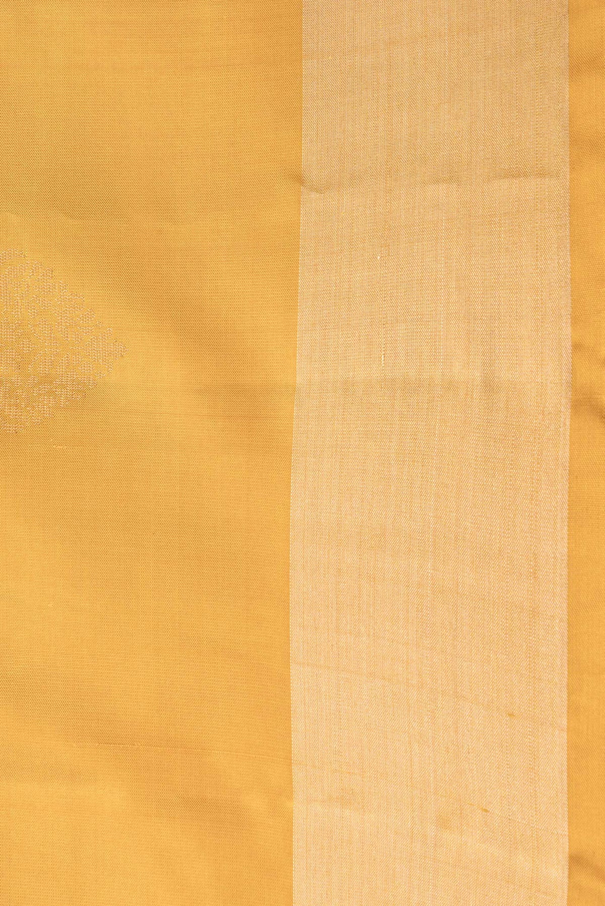Border image of Mustard Dual Tone Soft Silk Saree with Zari Butta on the body and Zari Border. 