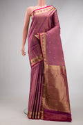 Rose pink Dual Tone Kanchipuram Silk Saree with Zari Butta on the body and Zari Border.  displayed on a mannequin