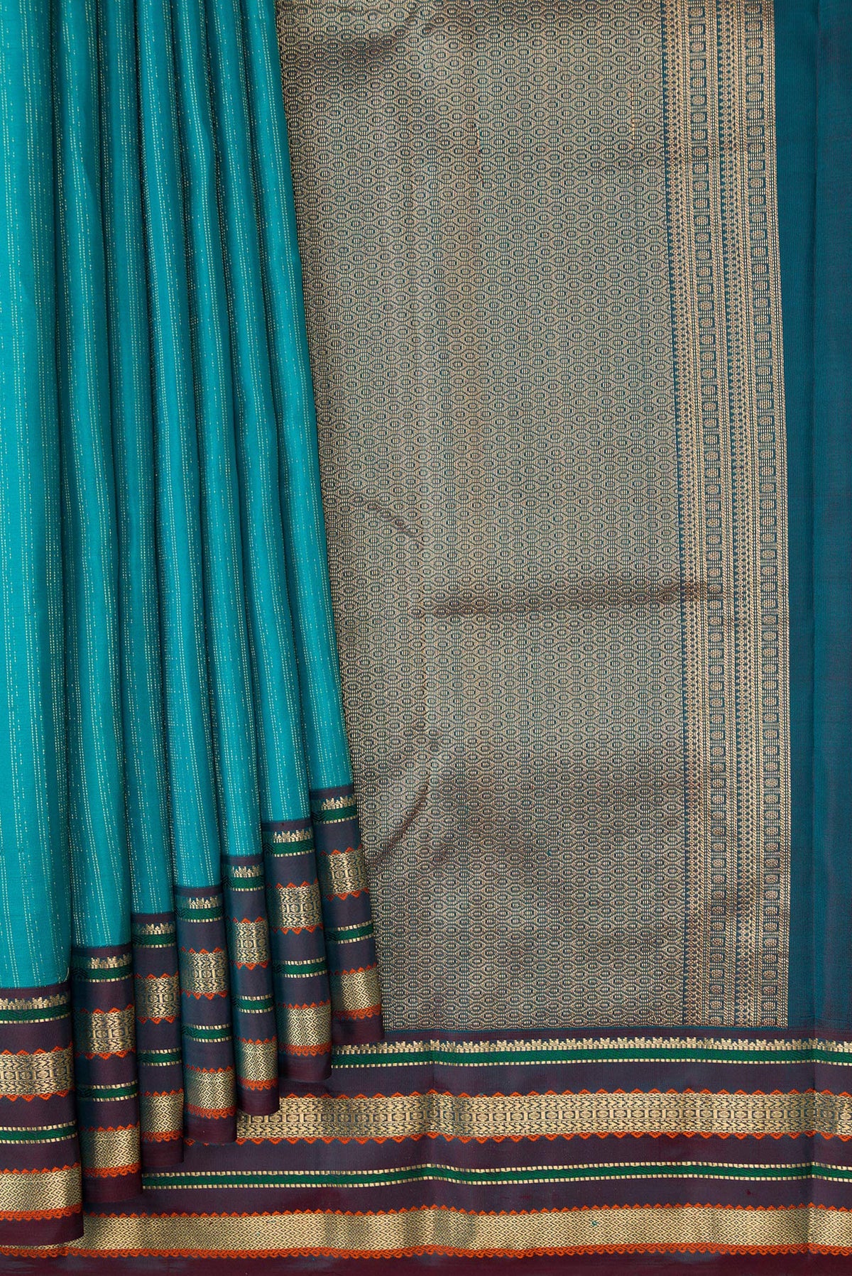Pleats and pallu of Sky Blue Dual Tone Kanchipuram Silk Saree with Stripes on the body and Zari And Thread Border. 