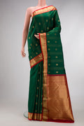 Green Dual Tone Kanchipuram Silk Saree with Stripes on the body and Zari Border.  displayed on a mannequin