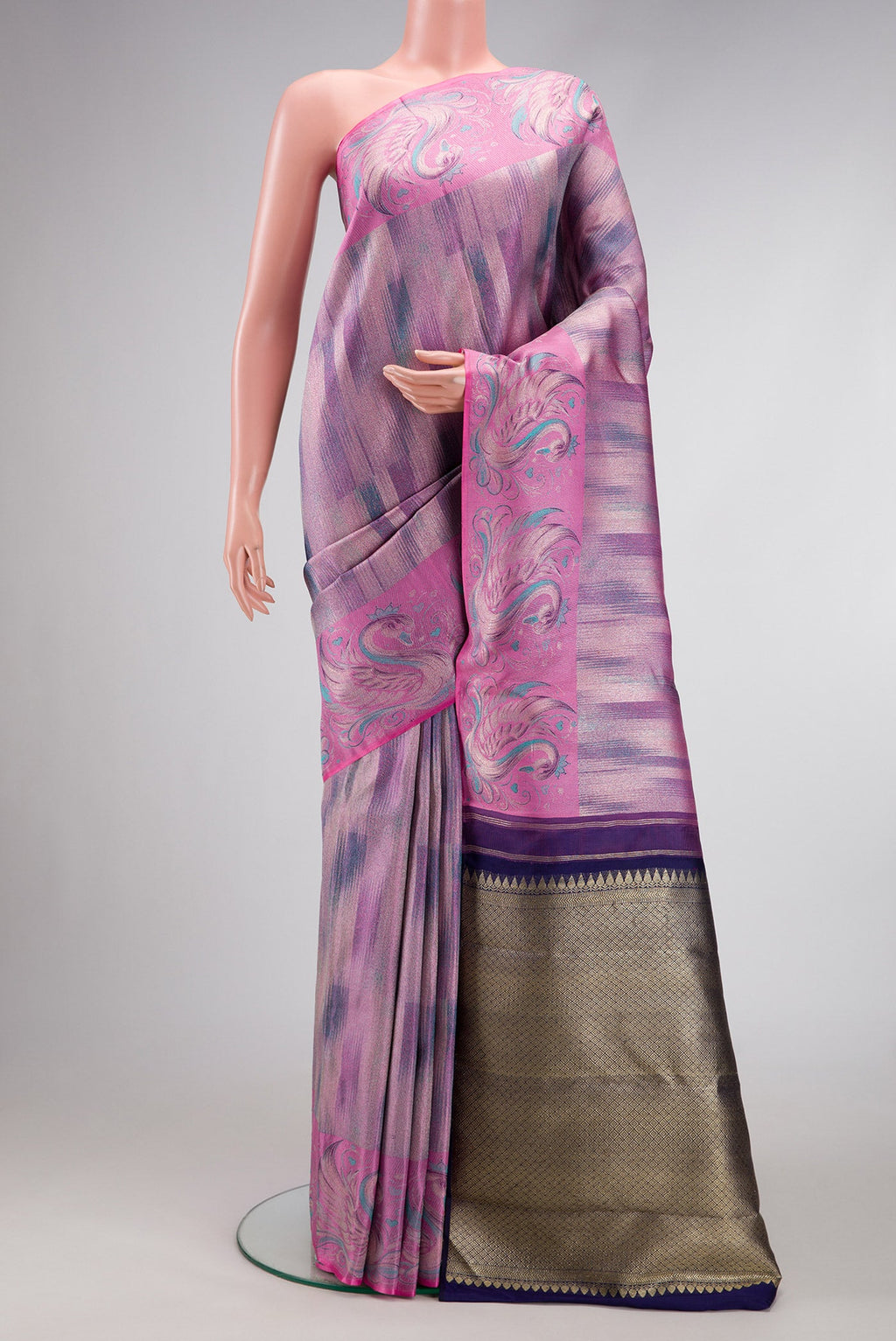Lavender Dual Tone Kanjivaram Tissue Silk Saree with Zari Brocade on the body and Fancy Border.  displayed on a mannequin