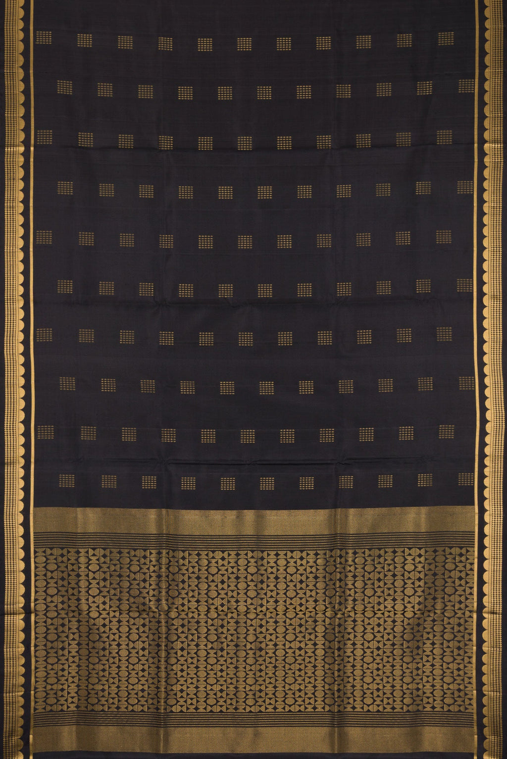 Flat view of Black Dual Tone Soft Silk Saree with Zari Butta on the body and Fancy Border. 