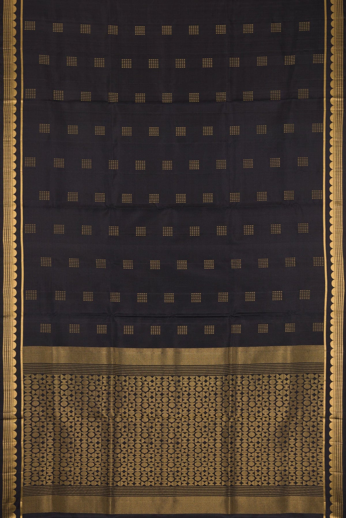 Flat view of Black Dual Tone Soft Silk Saree with Zari Butta on the body and Fancy Border. 