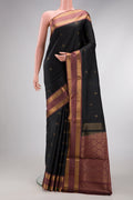 Black Dual Tone Soft Silk Saree with Zari Butta on the body and Zari Border.  displayed on a mannequin