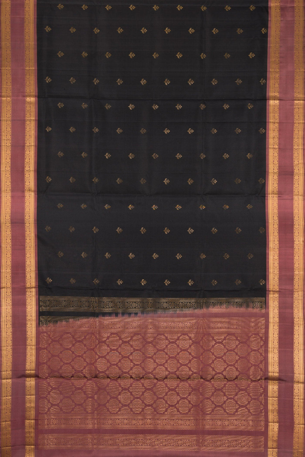 Flat view of Black Dual Tone Soft Silk Saree with Zari Butta on the body and Zari Border. 