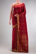 Maroon Dual Tone Soft Silk Saree with Zari Butta on the body and Zari Border.  displayed on a mannequin