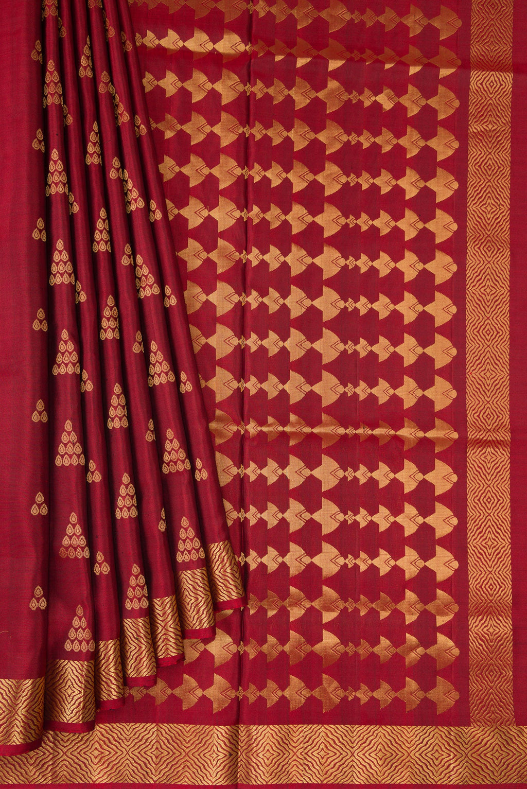 Pleats and pallu of Maroon Dual Tone Soft Silk Saree with Zari Butta on the body and Zari Border. 