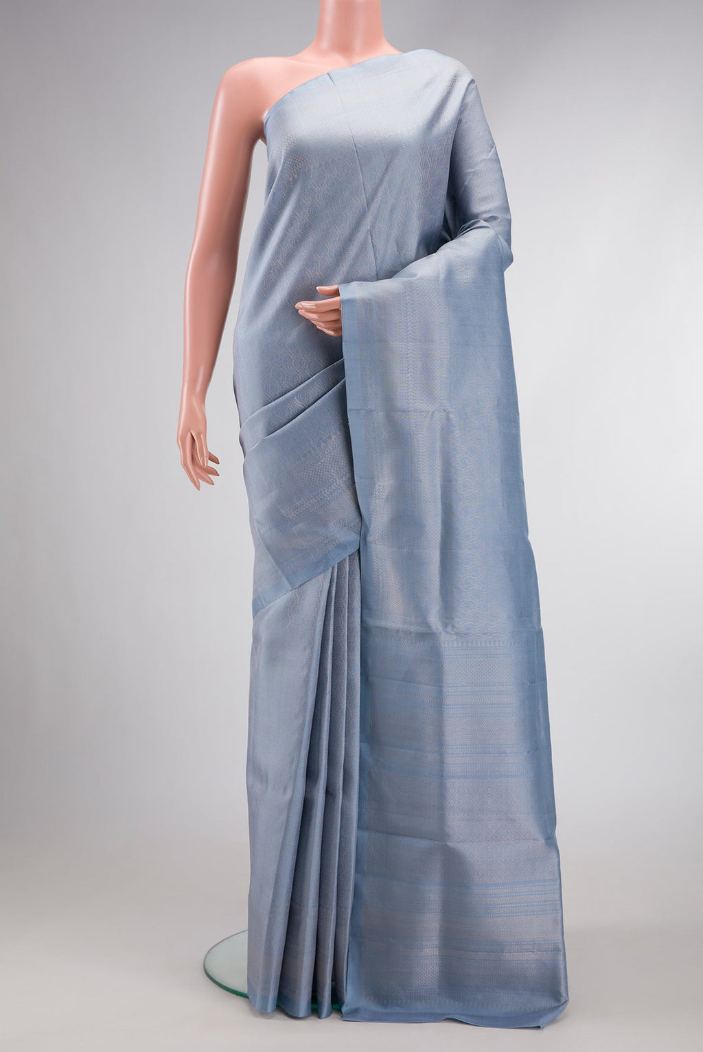 Grey Dual Tone Soft Silk Saree with Zari Brocade on the body and Zari Border.  displayed on a mannequin