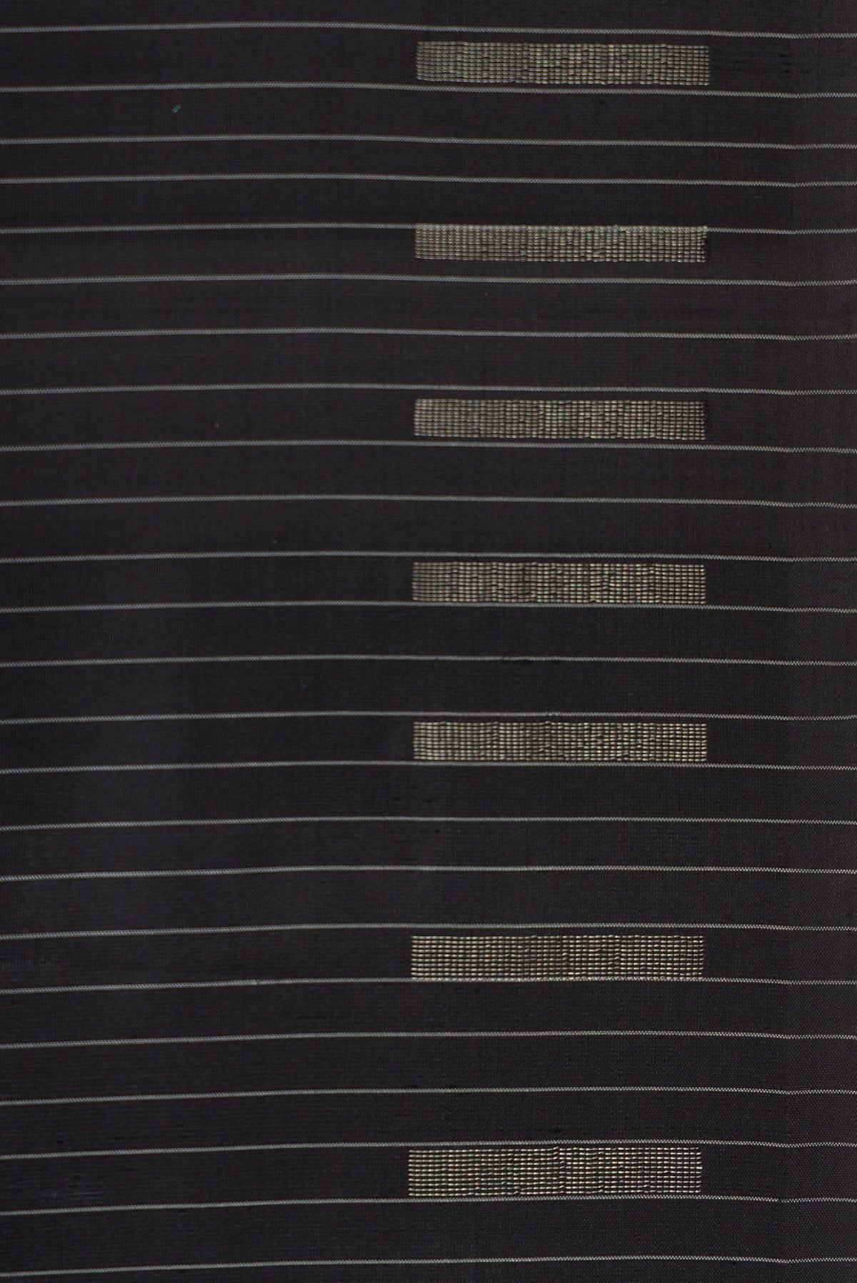 Border image of Black Dual Tone Soft Silk Saree with Stripes on the body and Zari Border. 