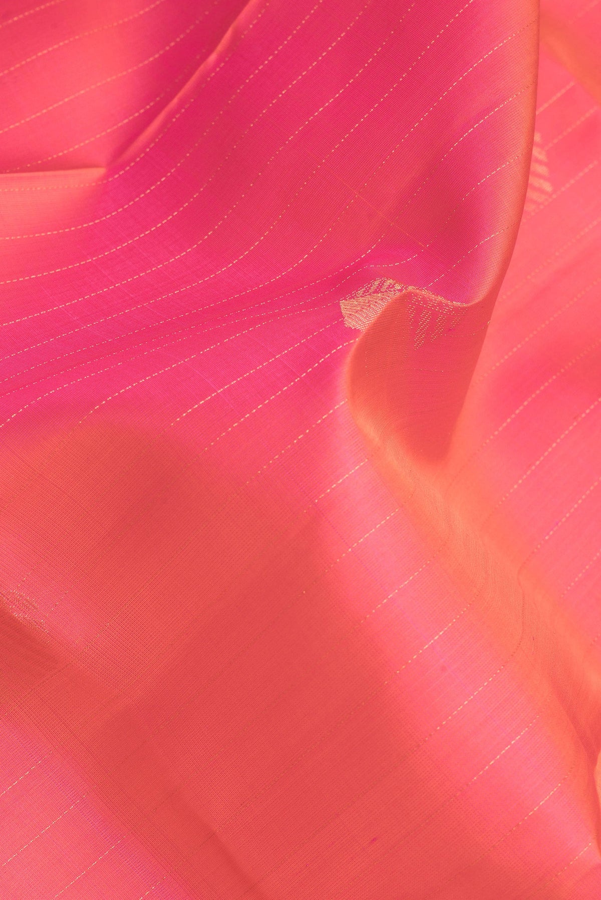 Close up of Pink Dual Tone Soft Silk Saree with Stripes on the body and Without Border.  displaying folds
