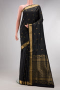 Black Dual Tone Soft Silk Saree with Zari Butta on the body and Zari Border.  displayed on a mannequin