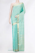 Sky Blue Soft Silk Saree with Zari Butta on the body and Zari Border.  displayed on a mannequin