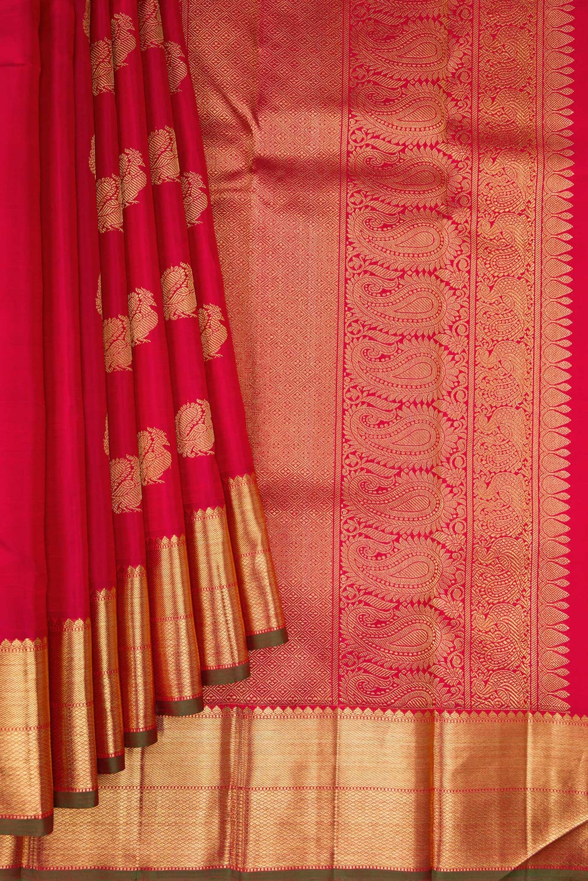 Pleats and pallu of Pure Silk Pure Zari Red Dual Tone Kanjivaram Saree with Zari Butta on the body and Zari Border. 