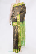 Grey Silk Cotton Saree with Zari Butta on the body and Zari Border.  displayed on a mannequin