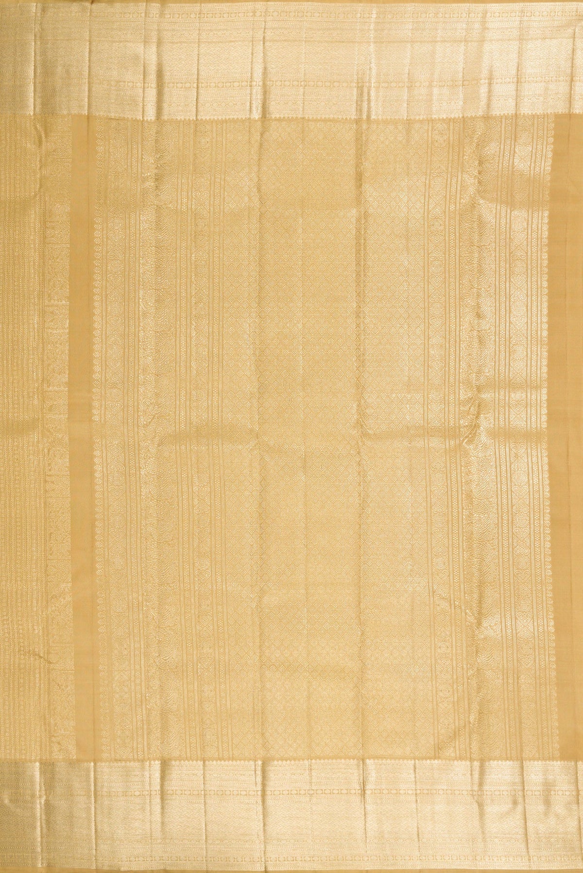 Close up image of the pallu of Dark Beige Dual Tone Kanchipuram Silk Saree with Zari Brocade on the body and Zari Border. 