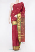 Maroon Kanjivaram Silk Saree with Zari Butta on the body and One Side Border.  displayed on a mannequin