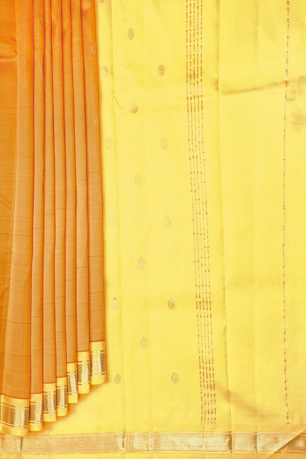 Pleats and pallu of Mustard Dual Tone Kanchipuram Silk Saree with Zari Butta on the body and One Side Border. 