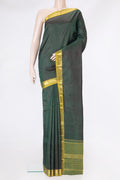 Bottle Green Dual Tone Kanjivaram Silk Saree with Plain Body and Zari Border.  displayed on a mannequin