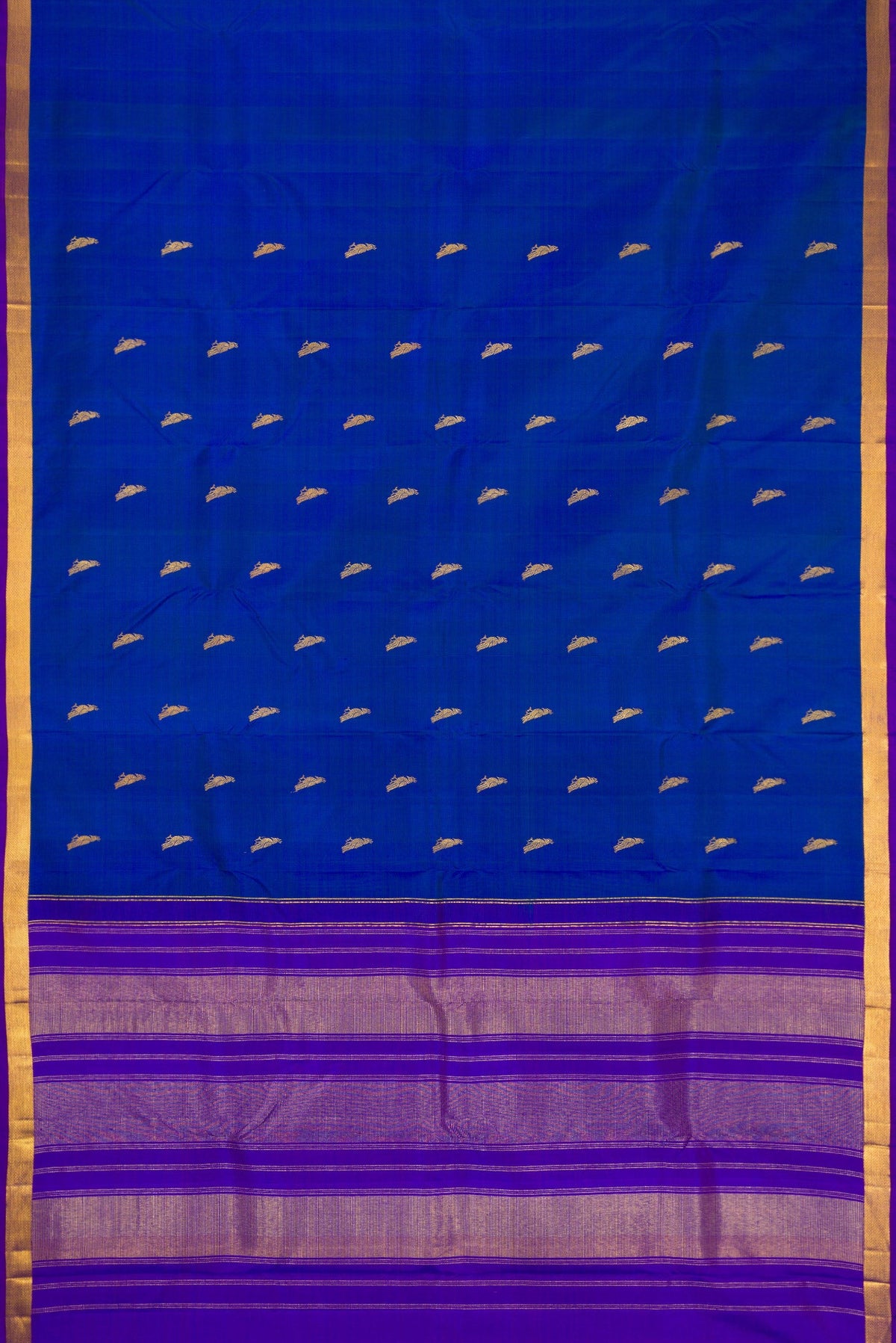 Flat view of Royal Blue Dual Tone Kanchipuram Silk Saree with Zari Butta on the body and Zari Border. 