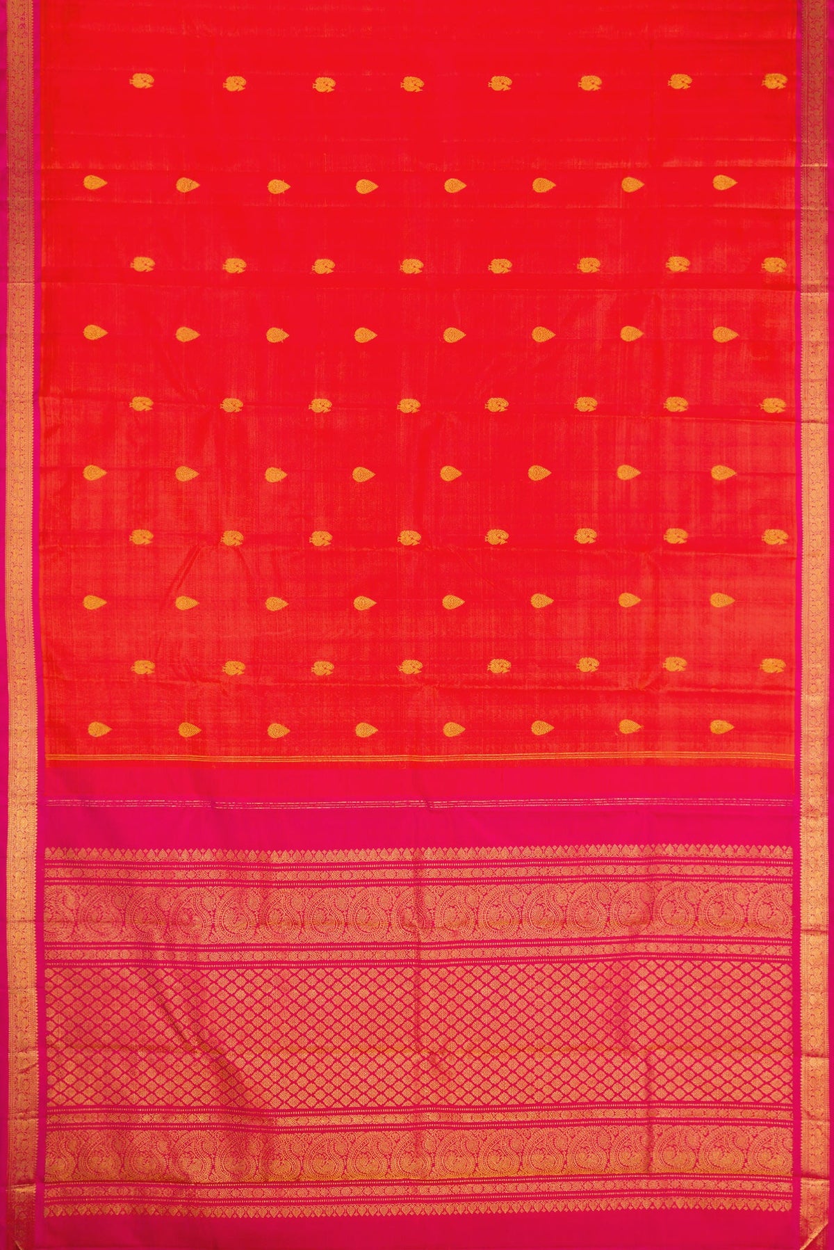 Flat view of Coral Dual Tone Kanchipuram Silk Saree with Zari Butta on the body and Zari Border. 