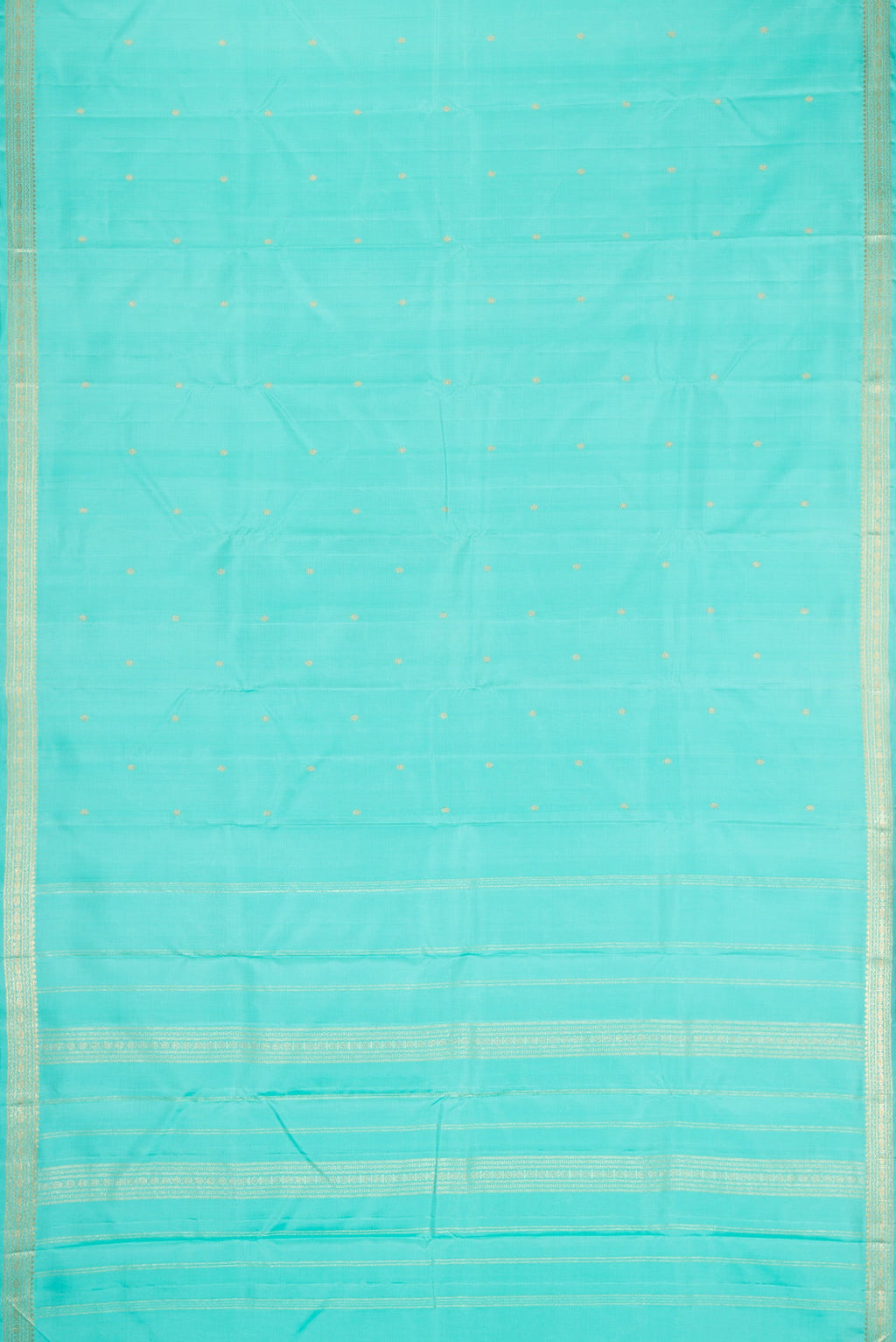 Flat view of Sky Blue Dual Tone Kanchipuram Silk Saree with Zari Butta on the body and Zari Border. 