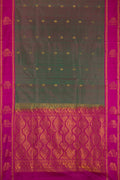 Multi Color Soft Silk Saree with Zari Butta on the body and Fancy Border.  displayed on a mannequin