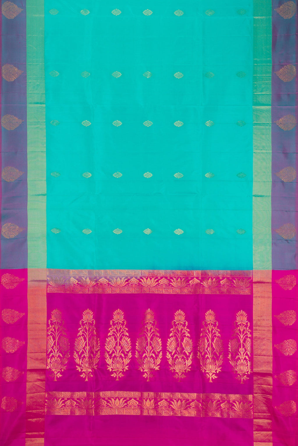Sea Green Soft Silk Saree with Zari Butta on the body and Fancy Border.  displayed on a mannequin
