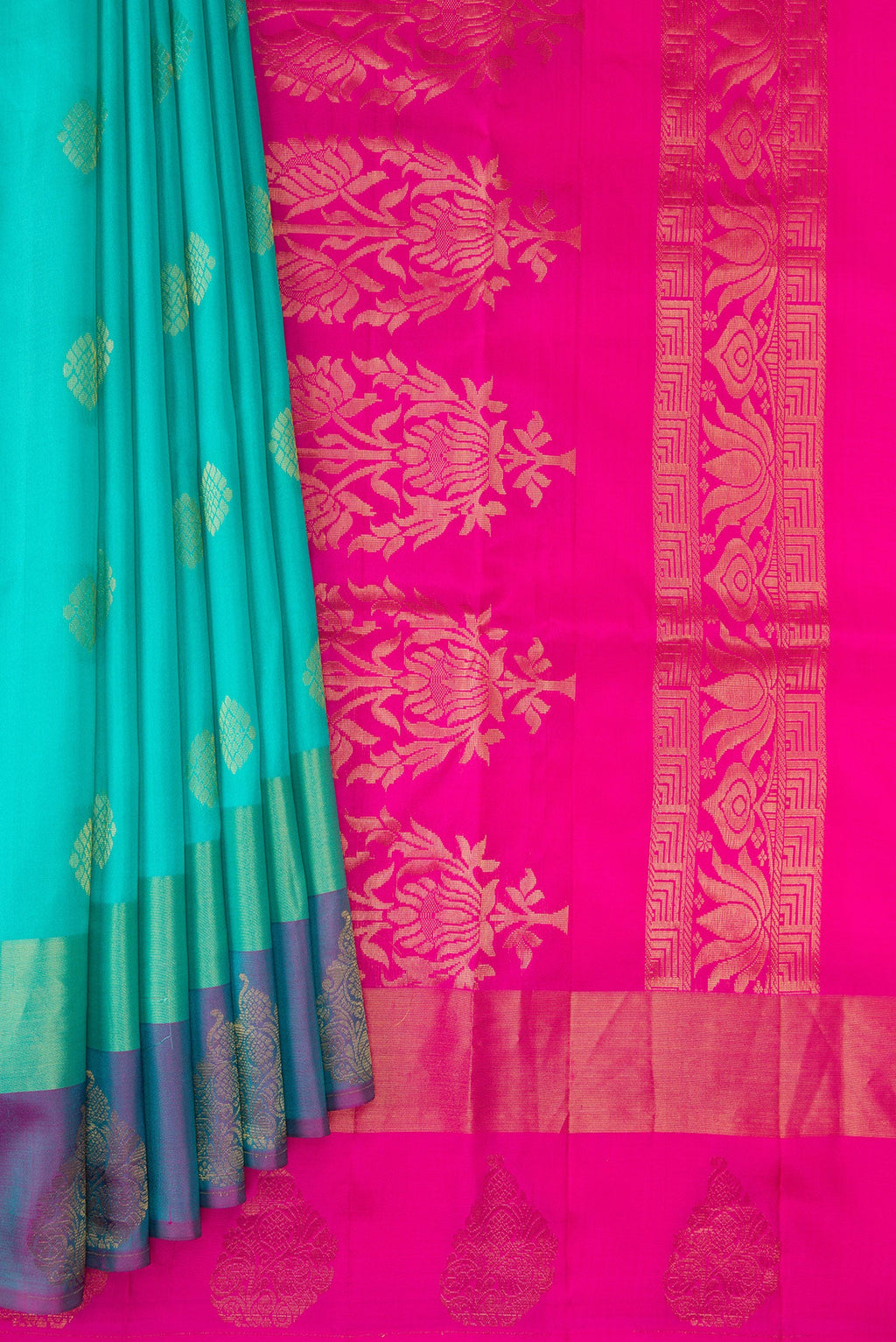 Pleats and pallu of Sea Green Soft Silk Saree with Zari Butta on the body and Fancy Border. 