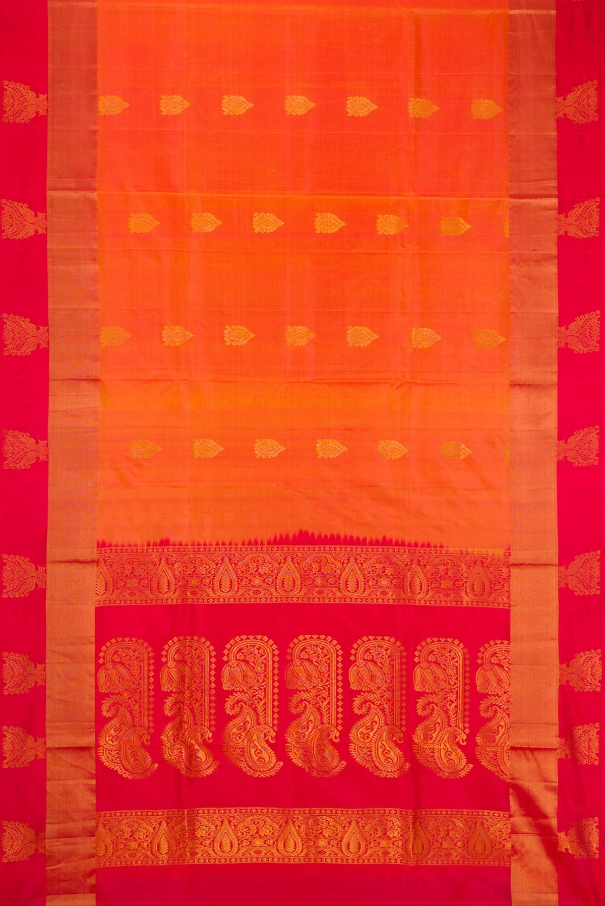 Flat view of Orange Dual Tone Soft Silk Saree with Zari Butta on the body and Fancy Border. 