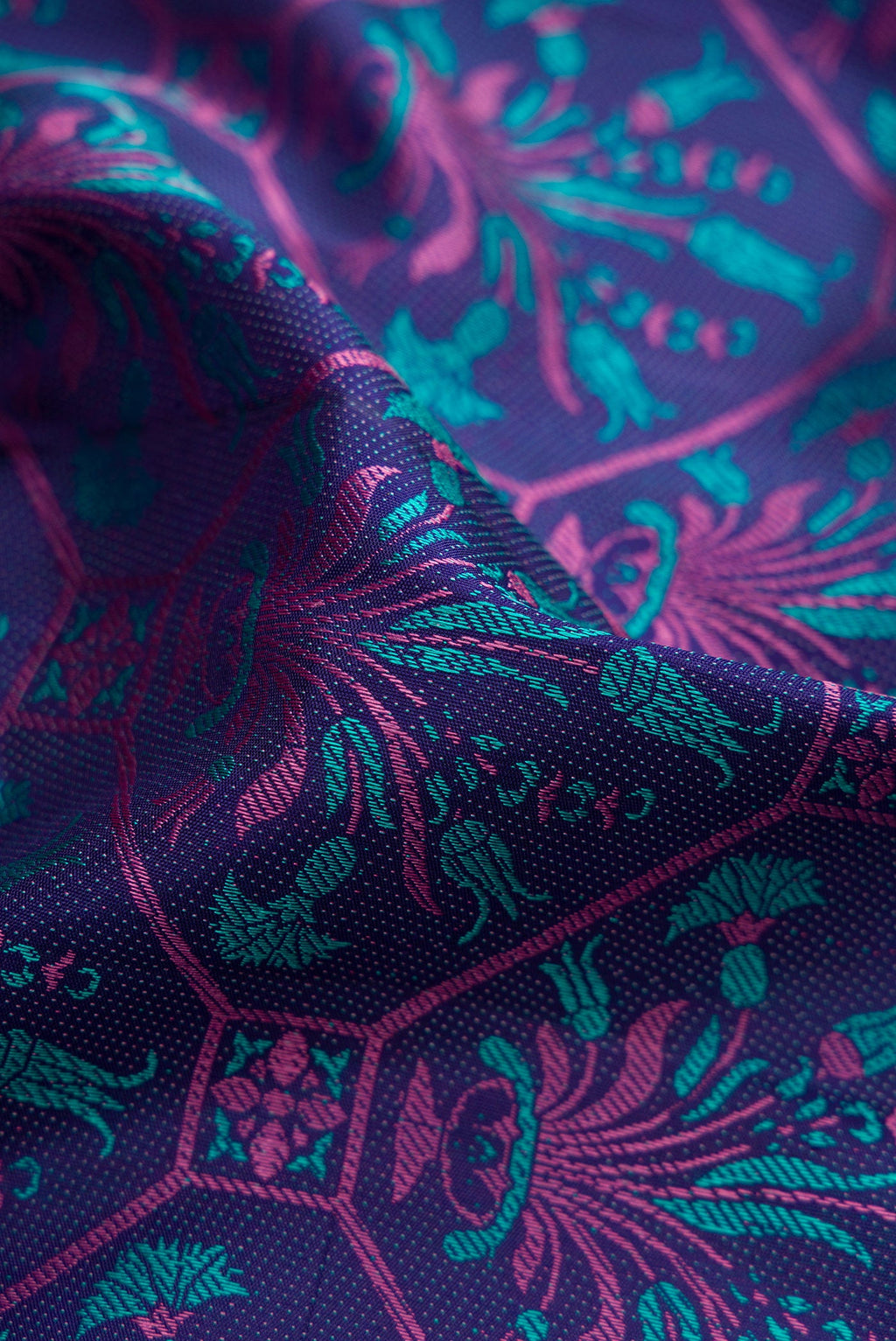 Close up of Navy Blue Kanchipuram Silk Saree with Jacquard design on the body and Fancy Border.  displaying folds