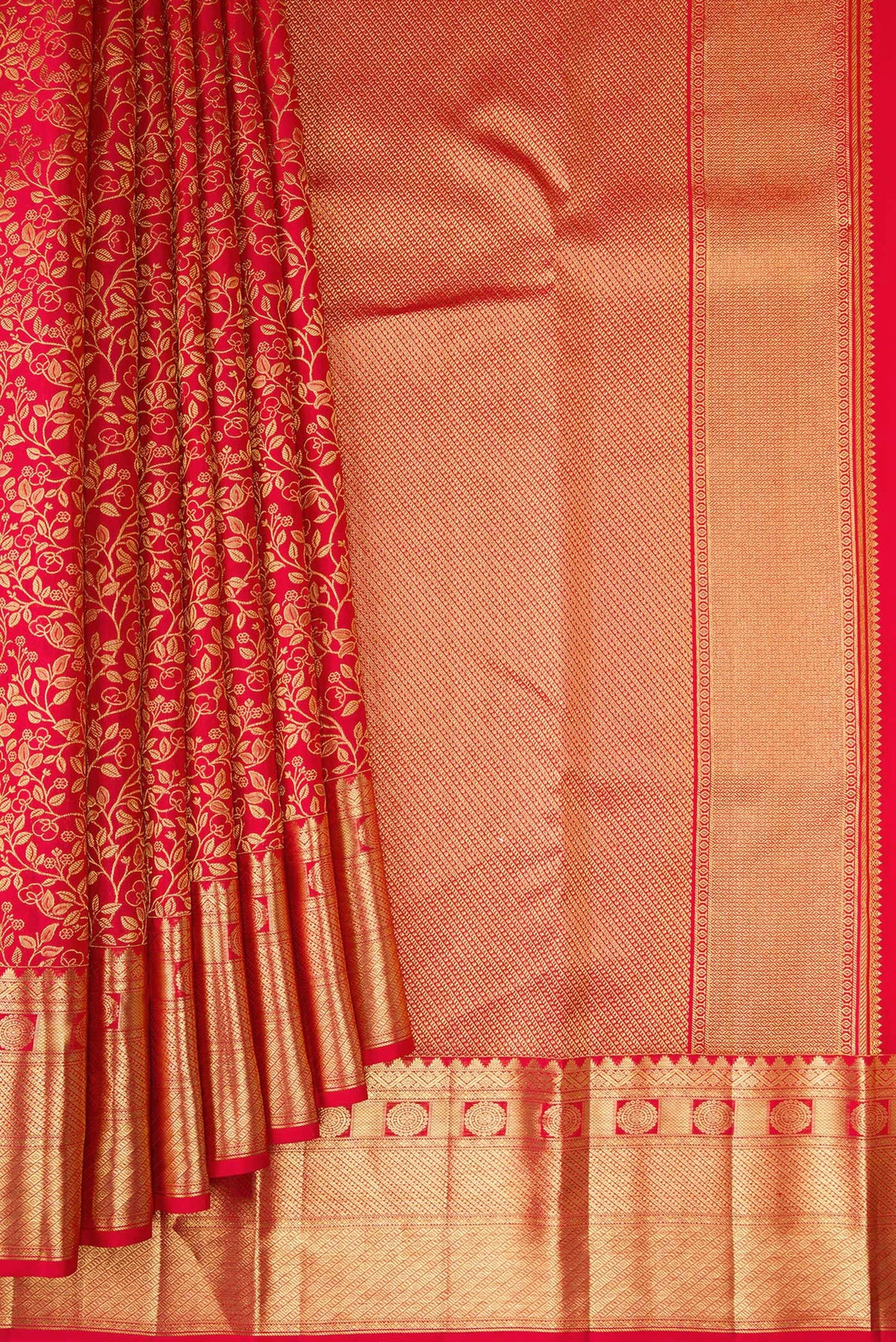Pleats and pallu of Red Kanchipuram Silk Saree with Zari Brocade on the body and Zari Border. 