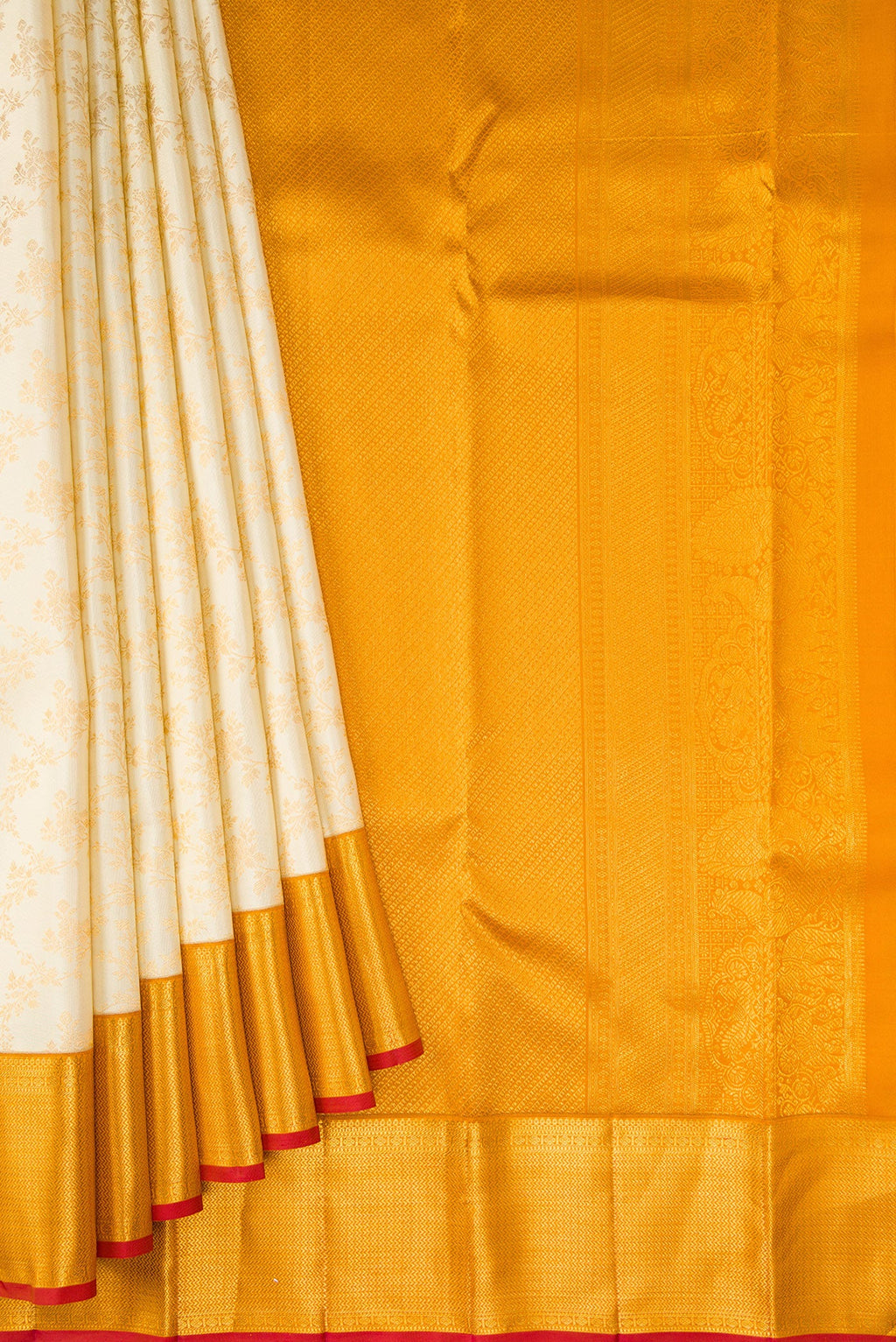 Pleats and pallu of Off White Kanjivaram Silk Saree with Zari Brocade on the body and Zari Border. 