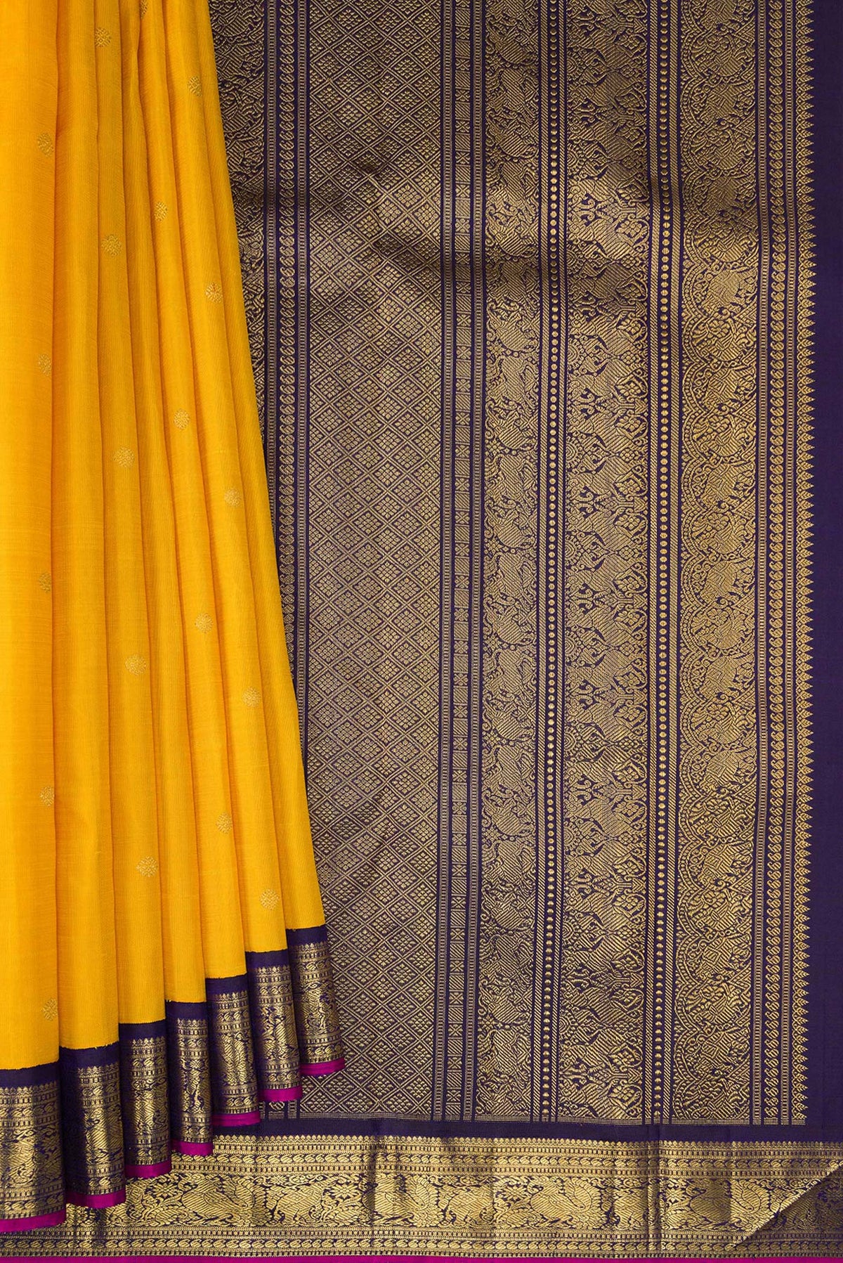 Pleats and pallu of Pure Silk Pure Zari Yellow Dual Tone Kanjivaram Saree with Zari Butta on the body and Zari Border. 