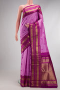 Pure Silk Pure Zari Lavender Kanchipuram Saree with Thread Butta on the body and Zari Border.  displayed on a mannequin