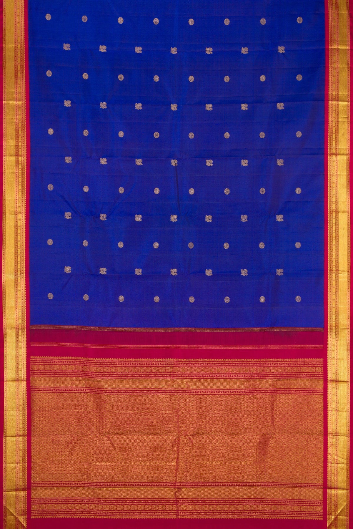 Flat view of Royal Blue Dual Tone Kanjivaram Silk Saree with Zari Butta on the body and Zari Border. 