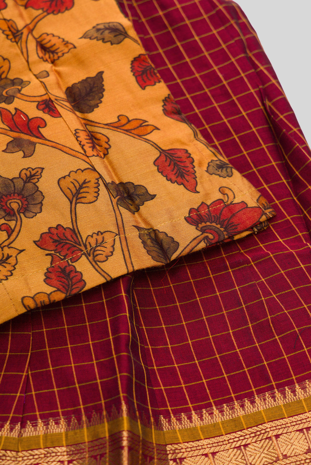 Detailed shot of Mustard Readymade Cotton Pavadai Set with Zari Butta on the body and Zari Border