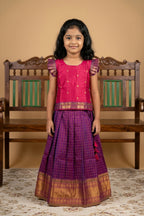 Coral Readymade Cotton Pavadai Set with Zari Butta on the body and Zari Border displayed on a mannequin