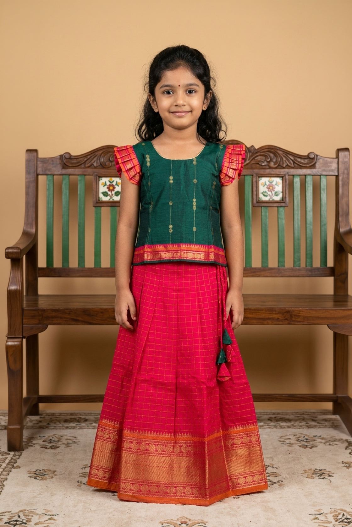 Green Readymade Cotton Pavadai Set with Zari Butta on the body and Zari Border displayed on a mannequin