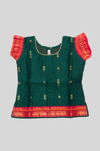 Close up blouse image of Green Readymade Cotton Pavadai Set with Zari Butta on the body and Zari Border